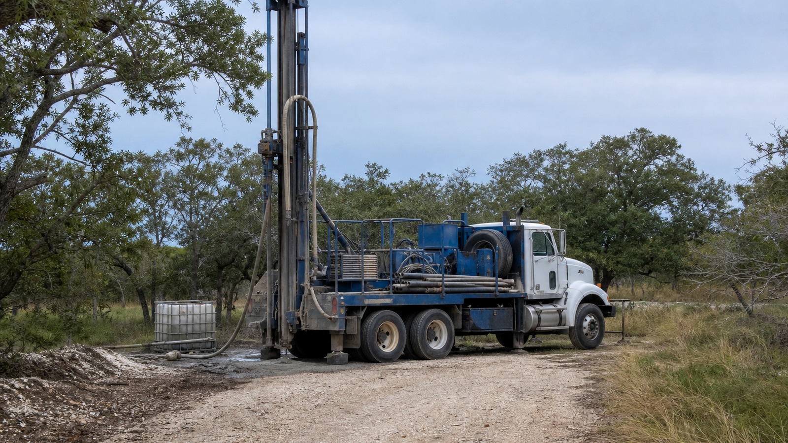 Aransas County Texas coastal drilling site and water well rig Aransas County Texas coastal drilling site with water well rig on shell road